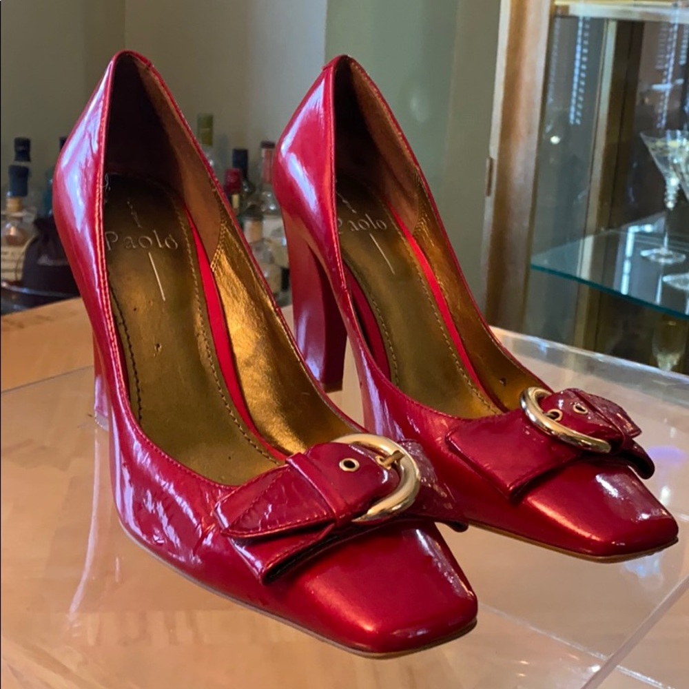 Red patent leather pumps